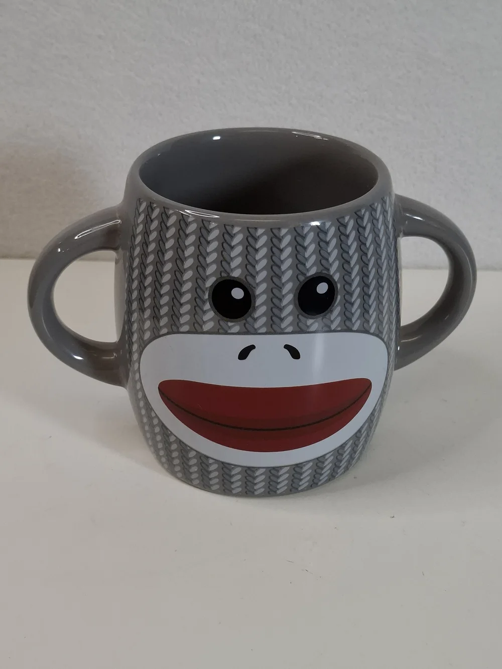 Gray Double-Handled Sock Monkey Ceramic Mug with Playful Face